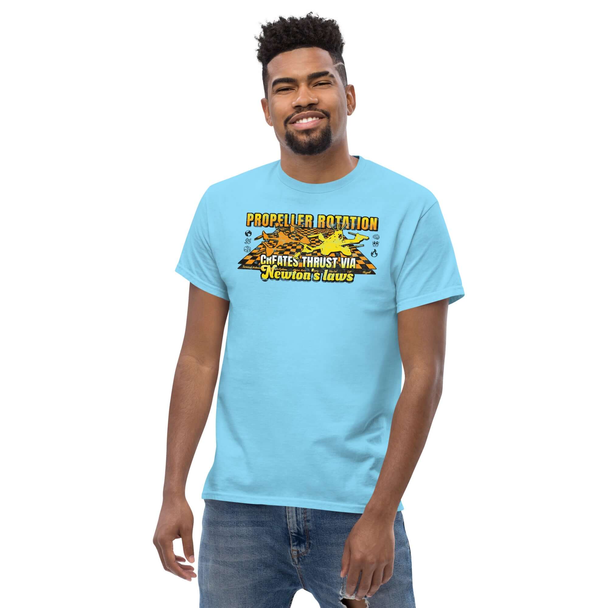 Man wearing blue t-shirt with drone science design and text "Propeller Rotation Creates Thrust Via Newton's Laws."