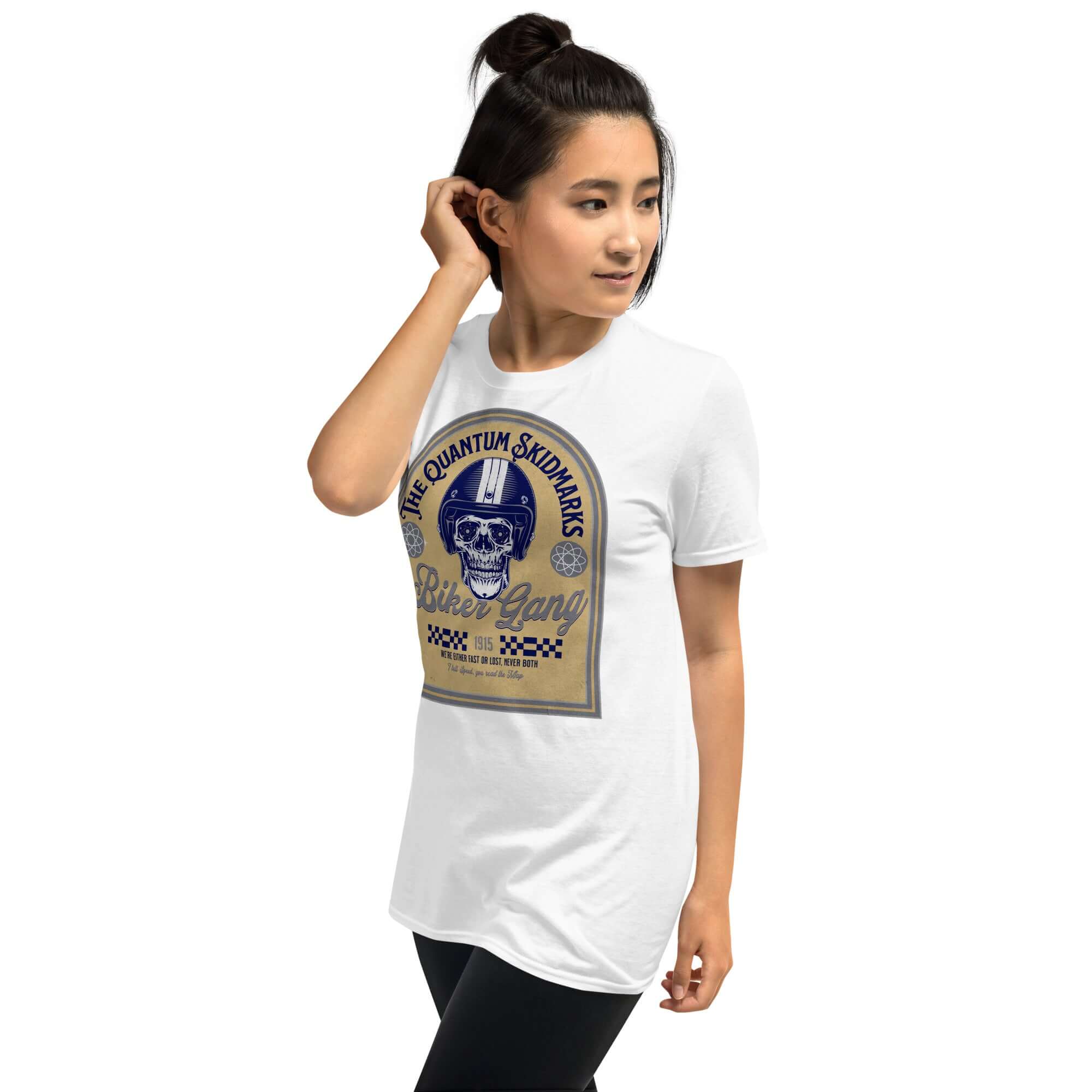 Woman wearing Quantum Skidmarks Motorcycle Club T-Shirt with grinning skull design, celebrating physics biker gang theme.