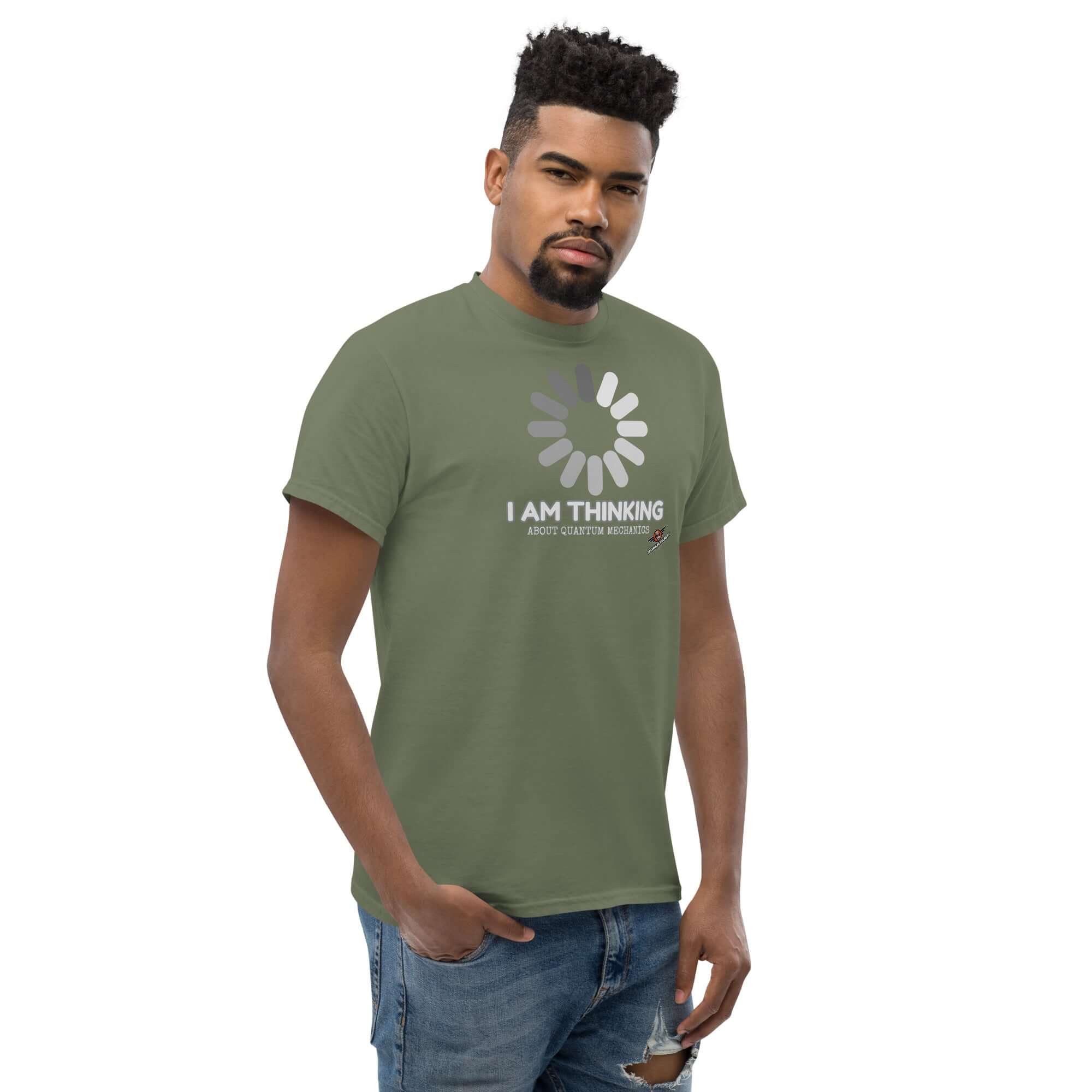 Model wearing 'I Am Thinking About Quantum Mechanics' t-shirt with loading screen design, green shirt, quantum theory humor apparel.