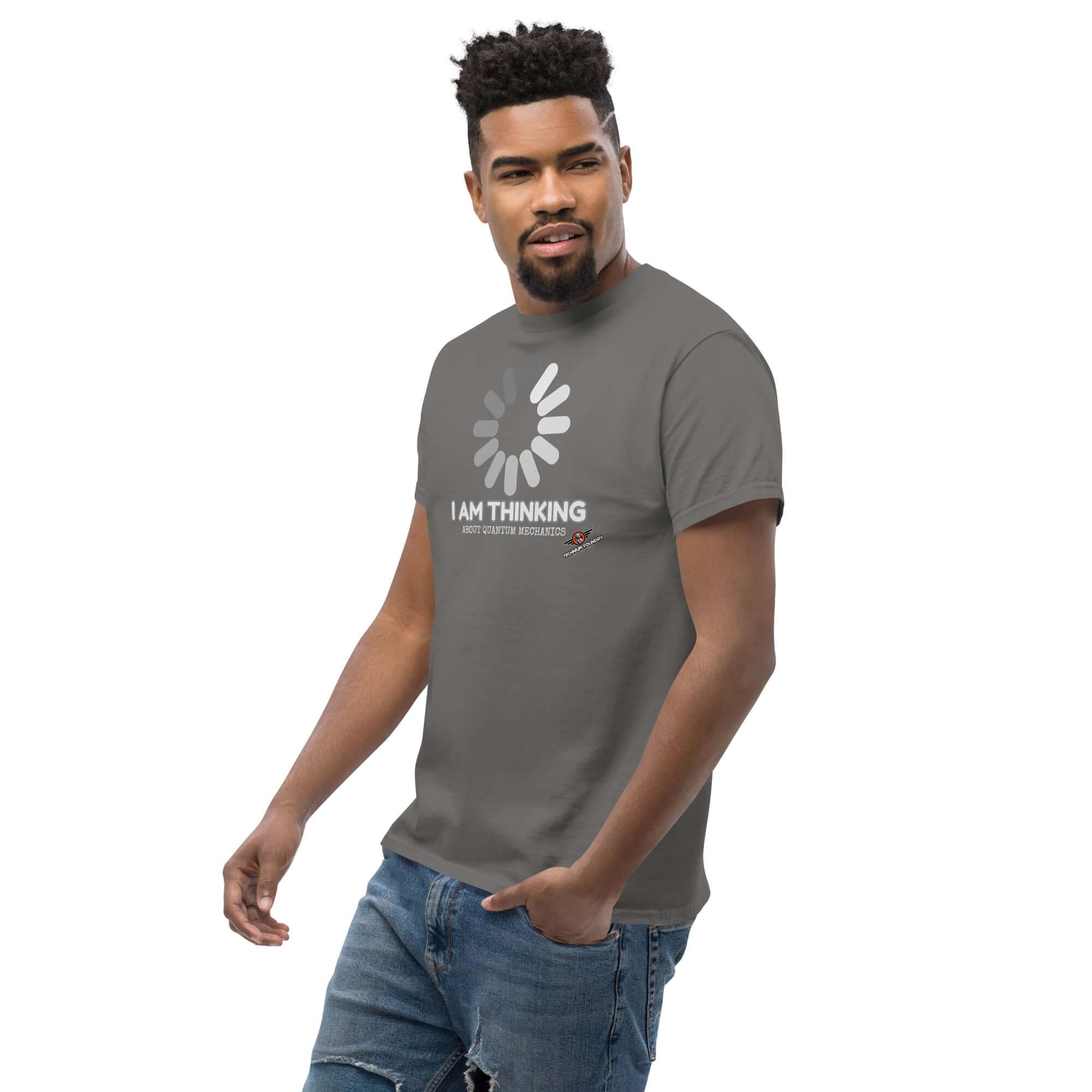 Man wearing quantum mechanics themed loading screen t-shirt with Schrödinger's Buffer design, contemplating uncertainty.
