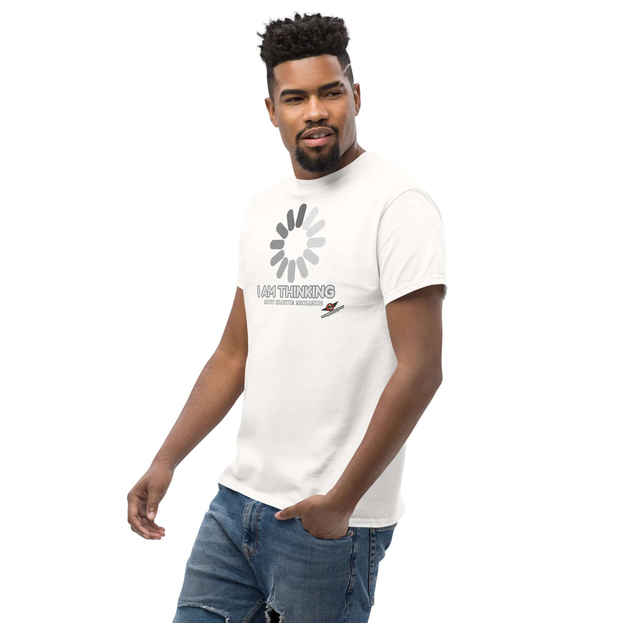 Man wearing "I Am Thinking About Quantum Mechanics" t-shirt; white tee with gray loading icon and minimalist design.