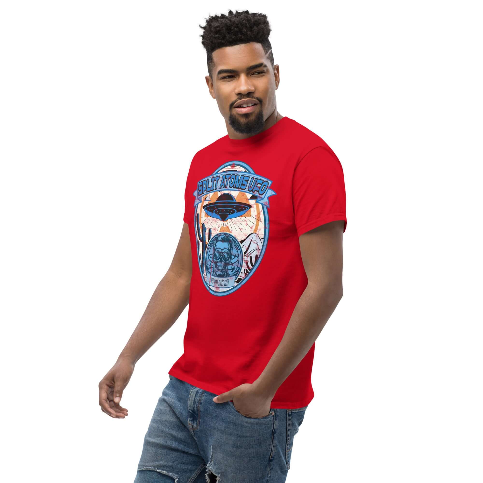 Red Split Atoms UFO T-Shirt with retro alien desert design, featuring a flying saucer over a desert landscape, worn by a male model.