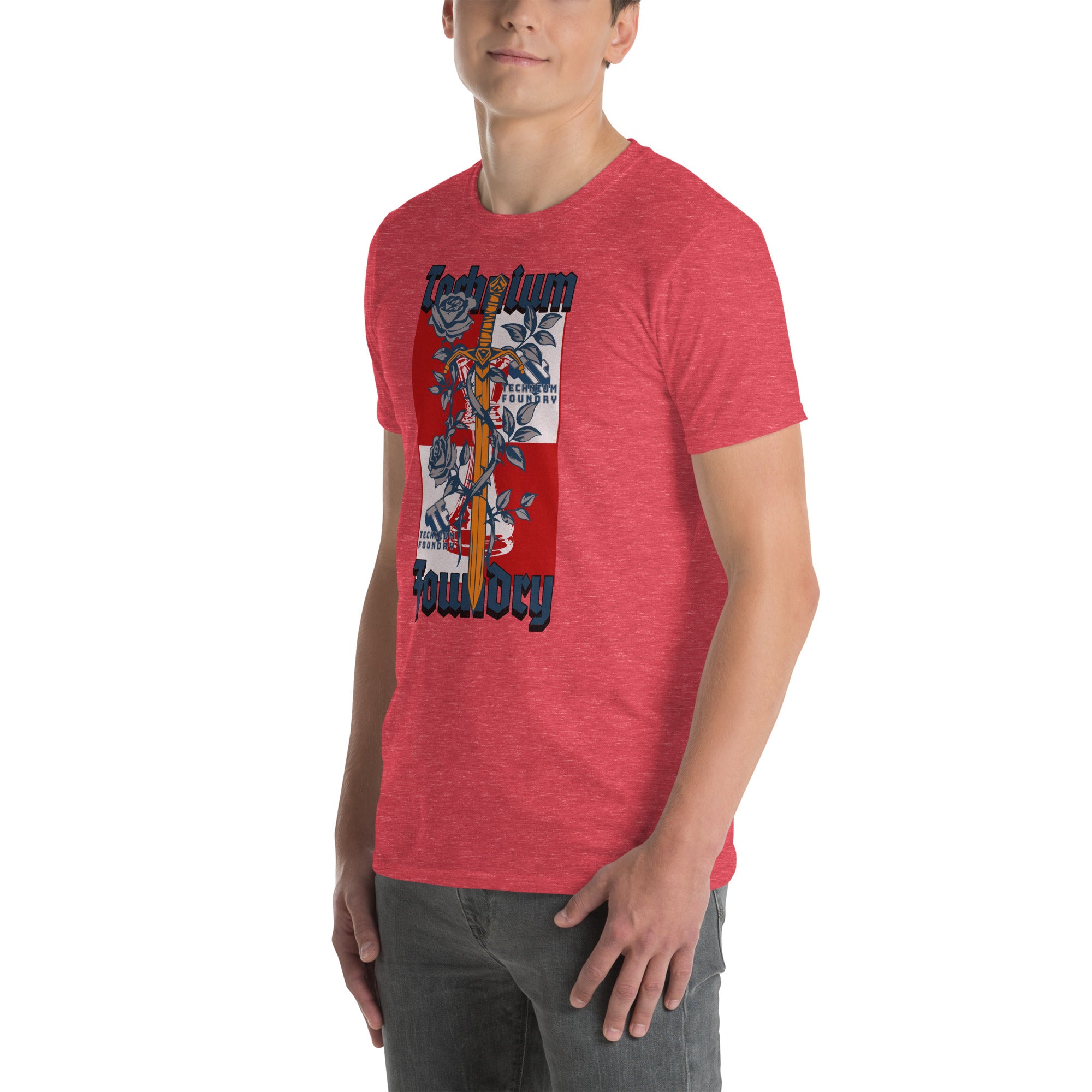 Man wearing a Technium Foundry Logo T-Shirt in vibrant orange, featuring an intellectual emblem design.