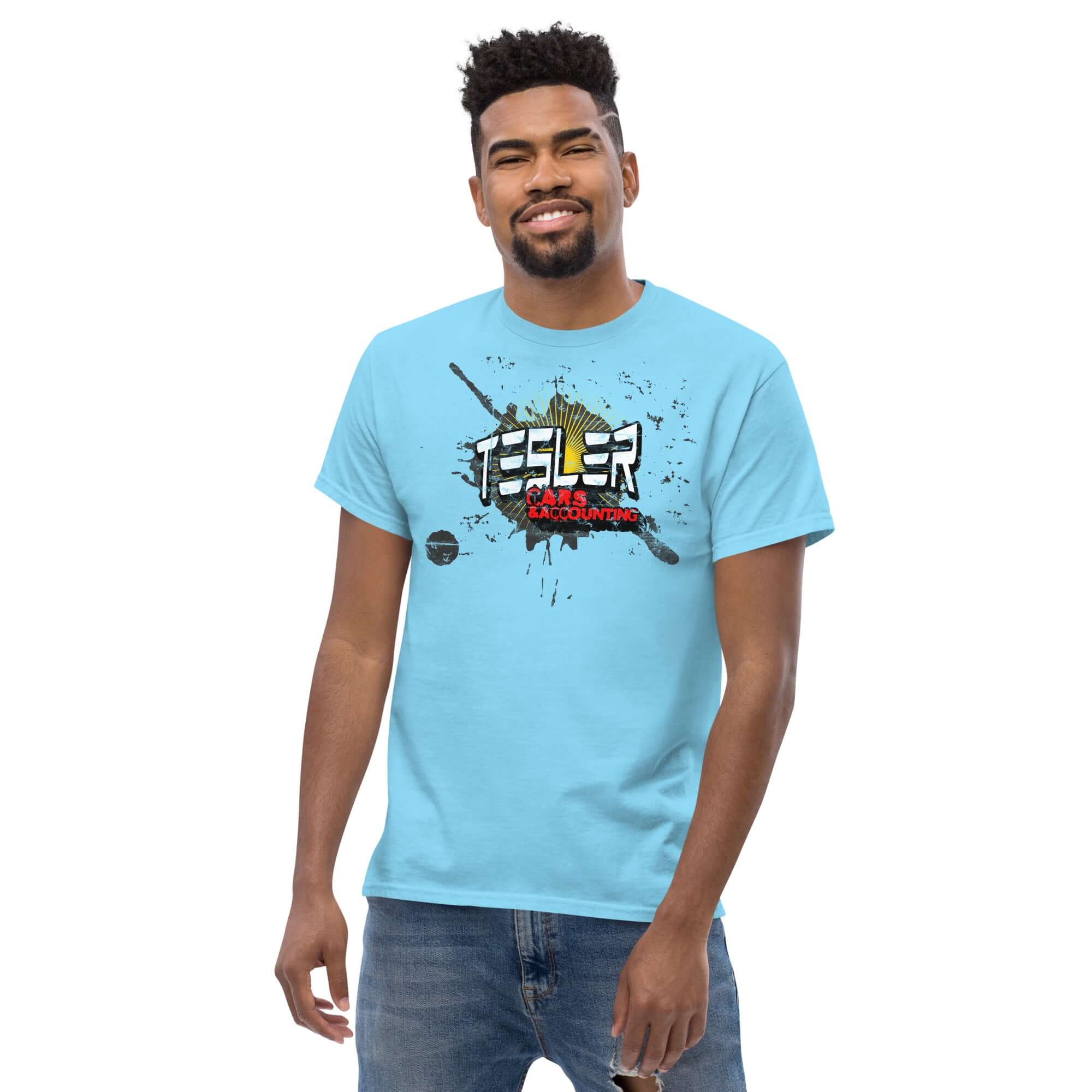 Man wearing a blue 'Tesler Cars & Accounting' parody t-shirt, blending electric car passion with accounting humor.
